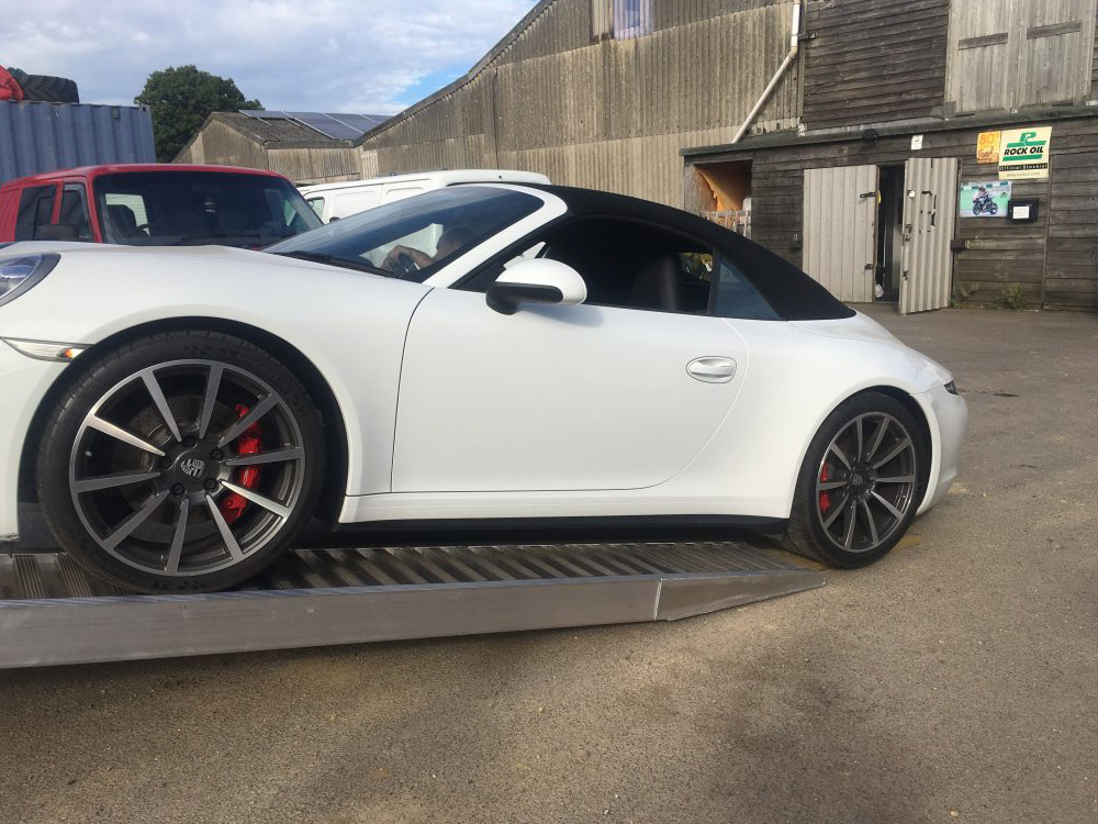 Aston martin and porsche transport uk europe